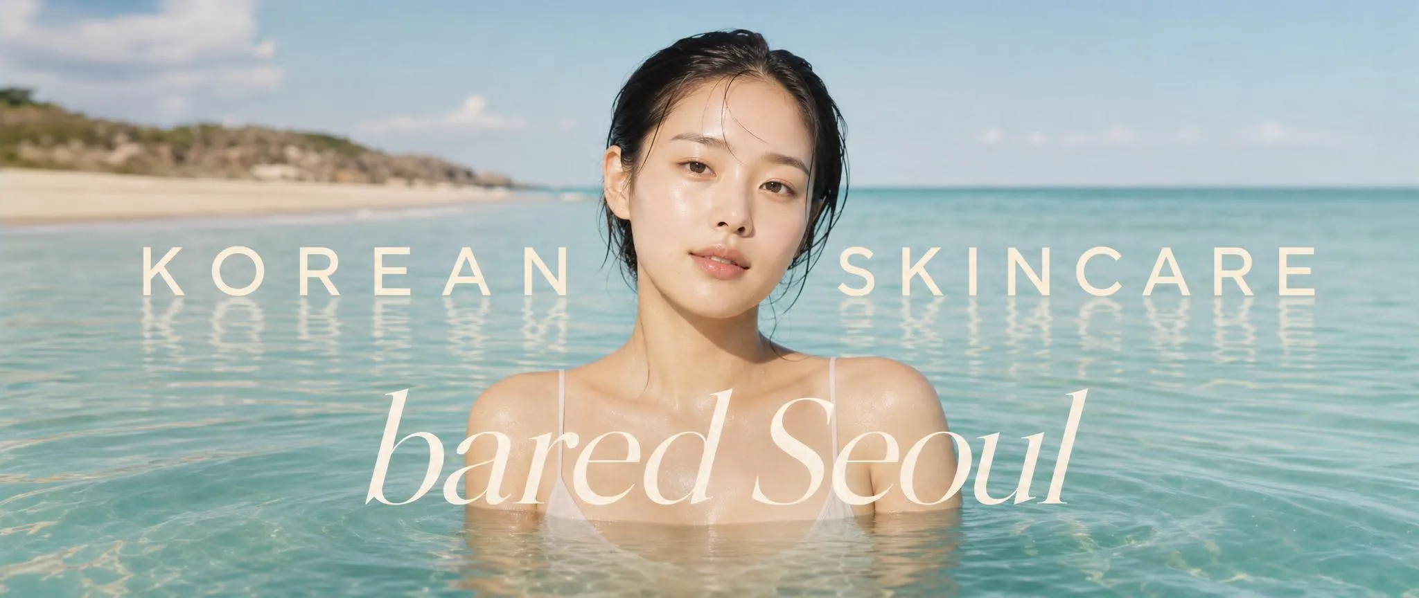 Korean skincare, bared Seoul — a woman with glass skin in clear coastal water